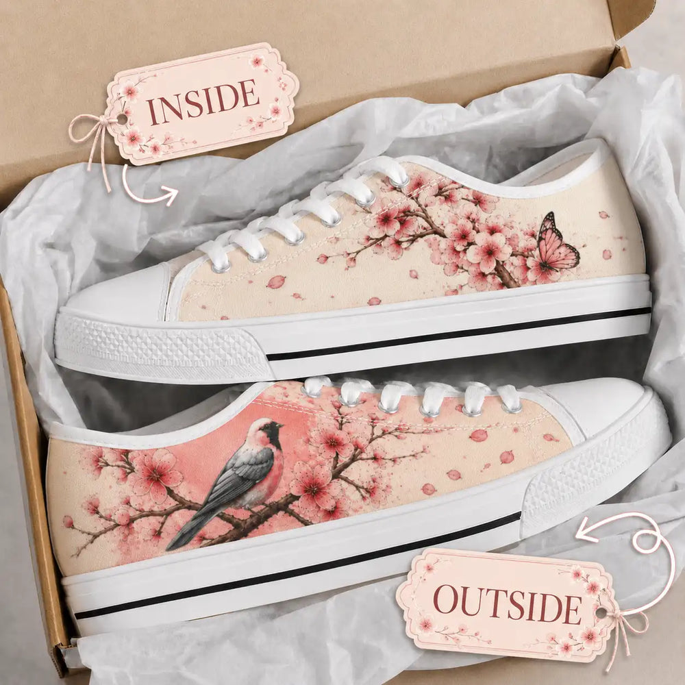 Pair of cherry blossom sneakers presented in a shoebox