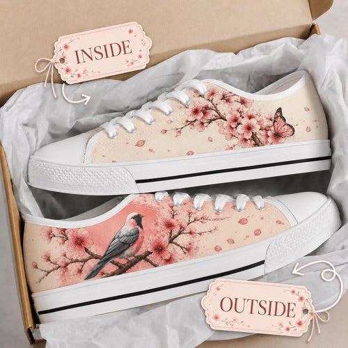 Pair of cherry blossom sneakers presented in a shoebox