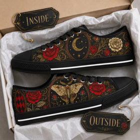 Black sneakers with red roses and crescent moon artwork