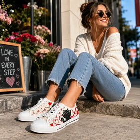 Black Cat Heart sneakers in playful lifestyle styling