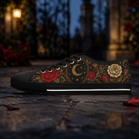 Women’s black low tops with gold ornamental details