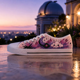 Women’s pink low tops with black bat wing details