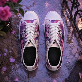 Creepy-cute sneakers with stars hearts and moon artwork