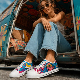 Moon and planet artwork on women’s low top sneakers