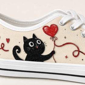 Red heart pattern on cream women’s sneakers