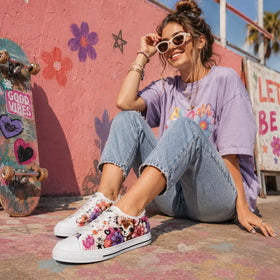 Women’s low tops with deer hearts and flower artwork