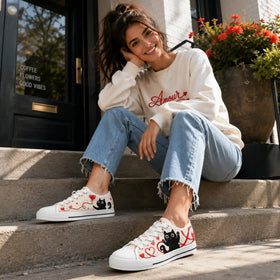Playful cat low tops with white laces and soles